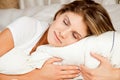 Young beauty woman couch in the bed and sleeping Royalty Free Stock Photo