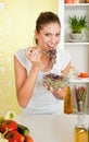Young beauty woman eating sprouts Royalty Free Stock Photo