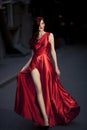 Young Beauty Woman In Fluttering Red Dress