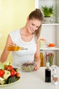 Young beauty woman making sprouts salad Royalty Free Stock Photo