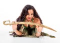 Young belly dancer with sword Royalty Free Stock Photo