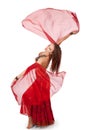 Young belly dancer turning with veil sleeves