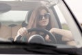 Young beuatiful woman driving a car Royalty Free Stock Photo