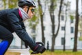 Young bicyclist in helmet during motion ride Royalty Free Stock Photo