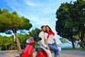 Young biker couple on the country road against the sky Royalty Free Stock Photo