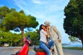 Young biker couple on the country road against the sky Royalty Free Stock Photo