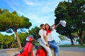 Young biker couple on the country road against the sky Royalty Free Stock Photo