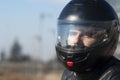 Young biker with helmet