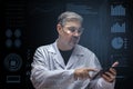 Young biologist working on a vaccine - creating drugs Royalty Free Stock Photo