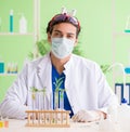 Young biotechnology scientist chemist working in lab Royalty Free Stock Photo