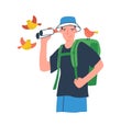 Young birdwatcher at ecotour. Traveler with backpack holding binoculars. Young male ornithologist watching birds Royalty Free Stock Photo