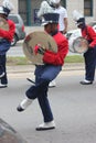 Young black male cymbal player in a marching band in the Cherry Blossom Festival in Macon, GA