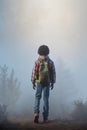 Young black boy. cute black boy with plaid shirt and backpack. Royalty Free Stock Photo