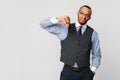 Young black businessman with a dissenting serious dislike expression with thumbs down in disapproval Royalty Free Stock Photo