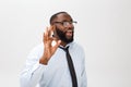 Young black businessman having happy look, smiling, gesturing, showing OK sign. African male showing OK-gesture with his Royalty Free Stock Photo