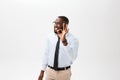 Young black businessman having happy look, smiling, gesturing, showing OK sign. African male showing OK-gesture with his Royalty Free Stock Photo