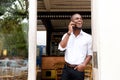 Young black businessman talking on mobile phone Royalty Free Stock Photo