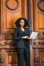 Young black businesswoman working on laptop computer in New York City Royalty Free Stock Photo