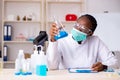 The young black chemist working in the lab Royalty Free Stock Photo