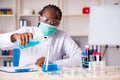 The young black chemist working in the lab Royalty Free Stock Photo