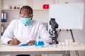 The young black chemist working in the lab Royalty Free Stock Photo