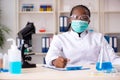 Young black chemist working in the lab Royalty Free Stock Photo