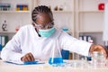 Young black chemist working in the lab Royalty Free Stock Photo