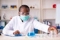 The young black chemist working in the lab Royalty Free Stock Photo