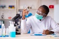 The young black chemist working in the lab Royalty Free Stock Photo