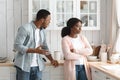 Young Black Couple Quarreling At Home, Indifferent Woman Ignoring Her Screaming Husband Royalty Free Stock Photo