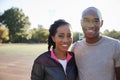 Young black couple smiling to camera in Brooklyn park Royalty Free Stock Photo