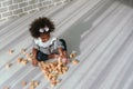 Young black girl is having fun playing and learning to strengthen her cognitive skills at home