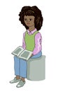 Young black girl sitting and reading a book Royalty Free Stock Photo