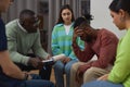 Young black man crying in support group circle Royalty Free Stock Photo