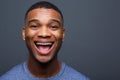 Young black man with funny smiling expression