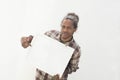 A young black man holding white board with isolated background in white Royalty Free Stock Photo