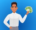 A young black man holds dollar bills in his hand. A handsome African man in a white shirt with money in his hand. A happy Royalty Free Stock Photo