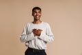 Young black man smiling while holding hands on his chest Royalty Free Stock Photo