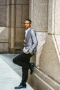 Young black man standing outdoors, thinking in New York City Royalty Free Stock Photo