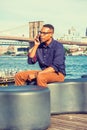 Young black man talking on cell phone outdoors in New York City Royalty Free Stock Photo