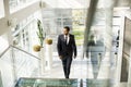 Young black man walking in the office Royalty Free Stock Photo