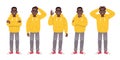 Young black man in a yellow hoodie and gray jeans is standing in different poses. A full-length man is a set of characters. The Royalty Free Stock Photo