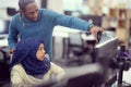 Young black muslim female software developer at work Royalty Free Stock Photo
