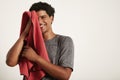 Young black sportsman wiping his face with a towel Royalty Free Stock Photo