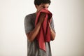 Young black sportsman wiping his face with a towel Royalty Free Stock Photo