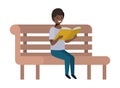 Young black student sitting reading book Royalty Free Stock Photo