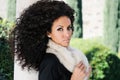 Young black woman, afro hairstyle, in urban background Royalty Free Stock Photo