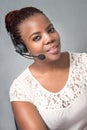 Young Black woman call center agent talking