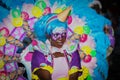 Young black woman dressed in colorful costume at Junkanoo