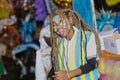 Young black woman dressed in colorful costume at Junkanoo